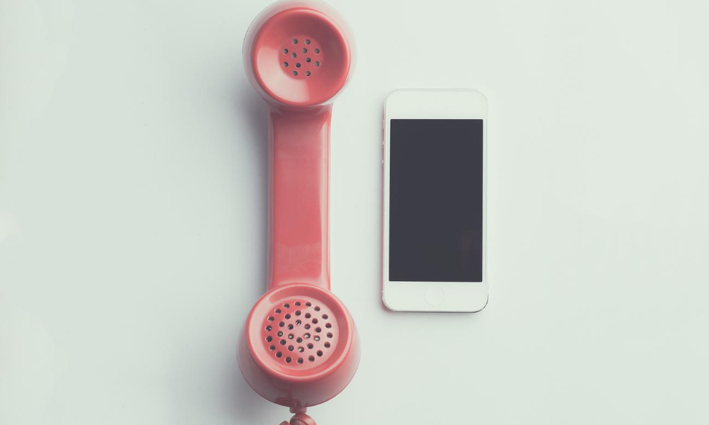 15 Critical Interview Questions For Property Management Companies 3 Picture of corded phone and an iPhone