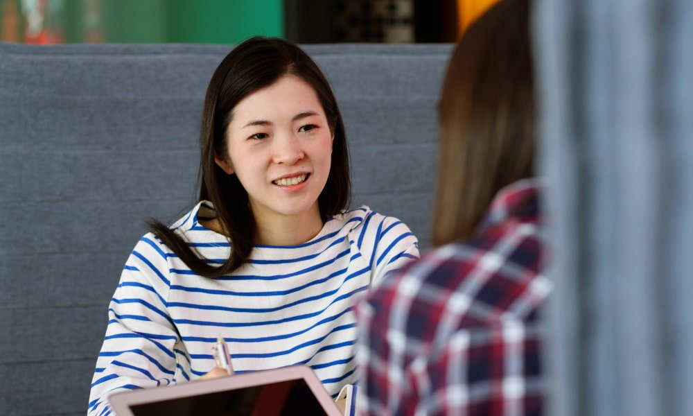 Critical Rent Verification Questions To Ask A Renter’s Personal References 1 person asking other person a question