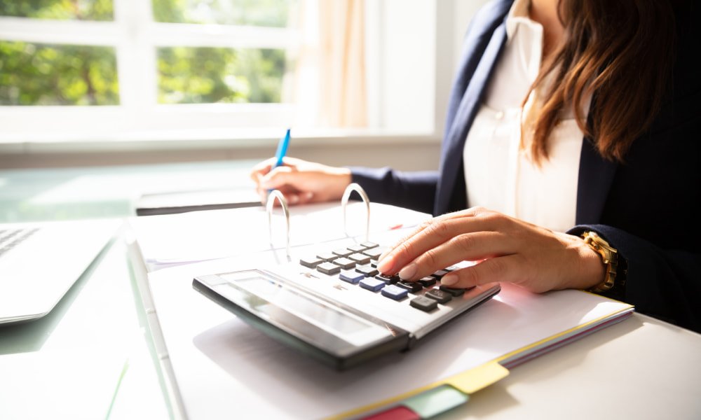 Landlords Guide to Prorated Rent Lease Agreement 1 Person calculating prorated rent