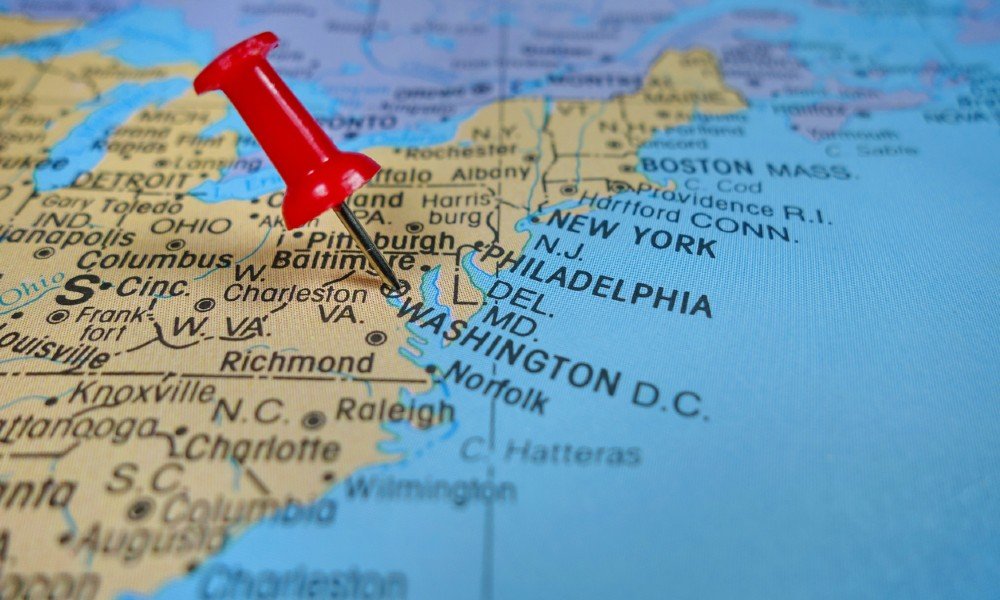 red pin on a map of northeastern United States pointed at moving to D.C