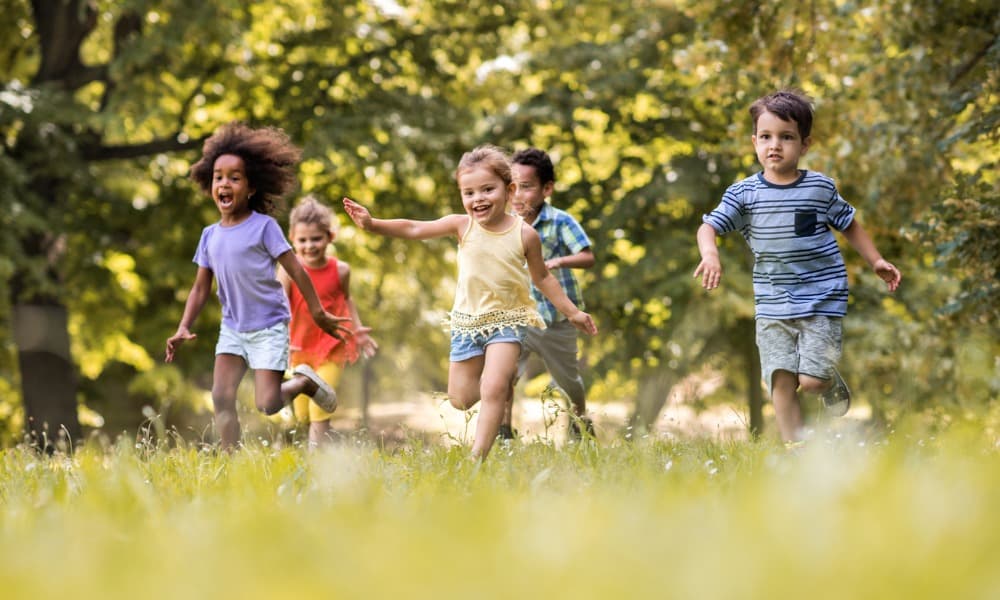 children running and playing at one of the parks in Hyattsville, MD