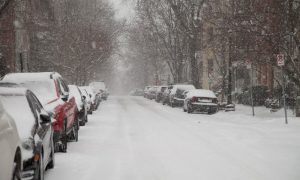 A snowy neighborhood required to follow the snow removal laws D.C. has in place