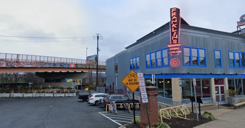 Exterior view of Franklin's Brewery, Restaurant, and General Store with its signage prominently displayed.