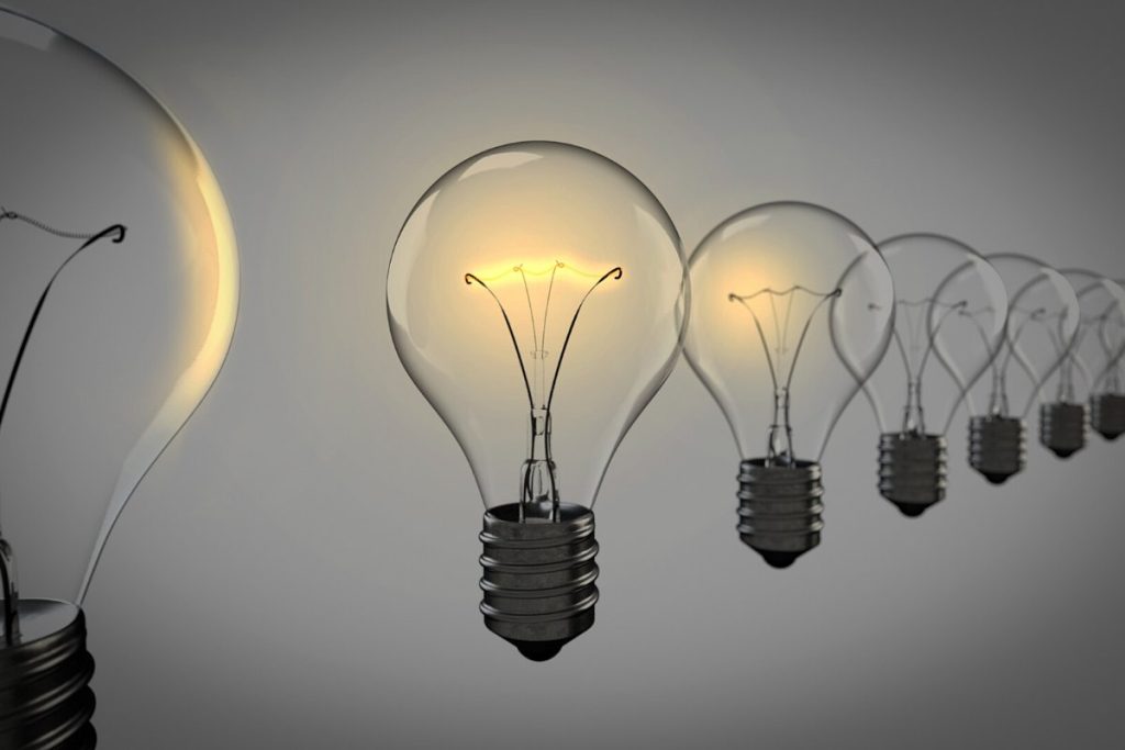 One light bulb on with a few off