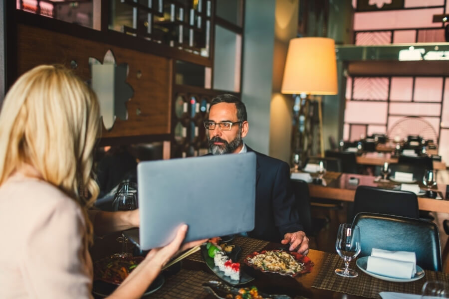 Business associates having brunch together in a restaurant in Alexandria 