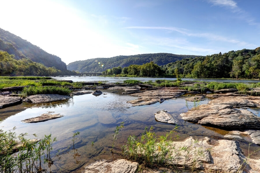 calm waters with surrounding rocks in the potomac river 