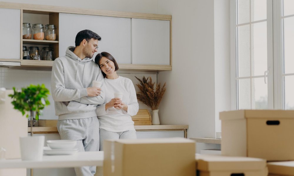 Couple who understand landlord and tenant act in their new apartment
