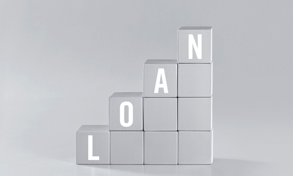 A set of stairs where the letters spell loan