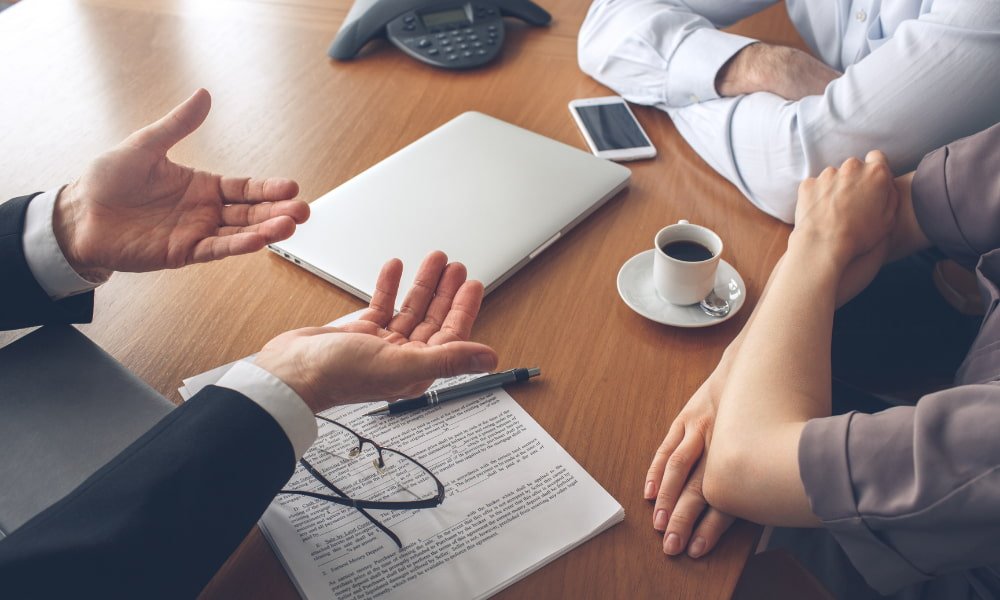 Couple working with advisor to determine Rent Price