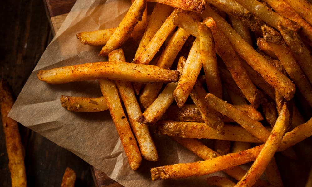10 Must-Visit Restaurants in Falls Church, VA 1 french fries on parchment paper