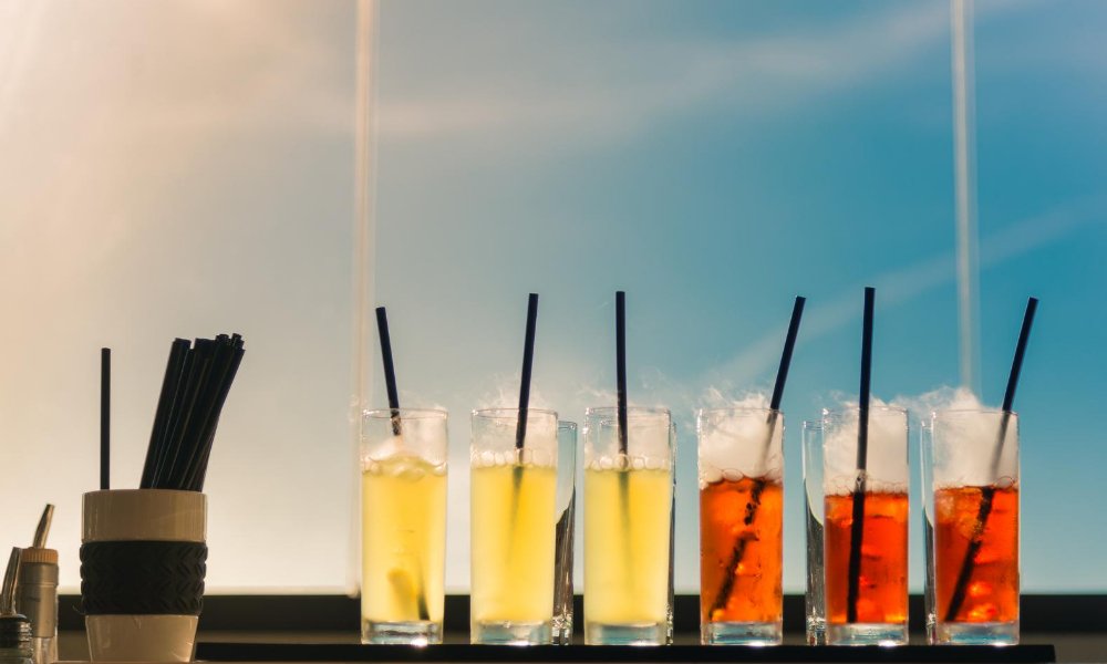 Picture of 6 cocktails on a bar