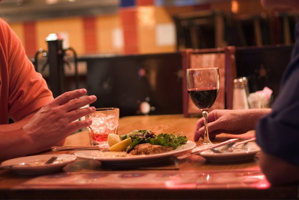 Two people at a fancy dinner