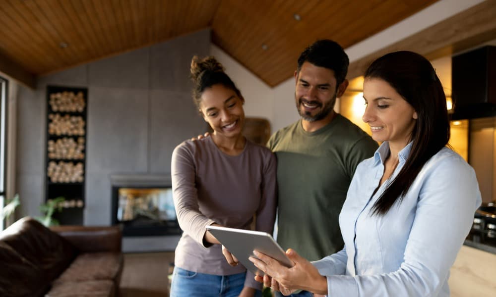 People reviewing illegal landlord actions before renting an apartment
