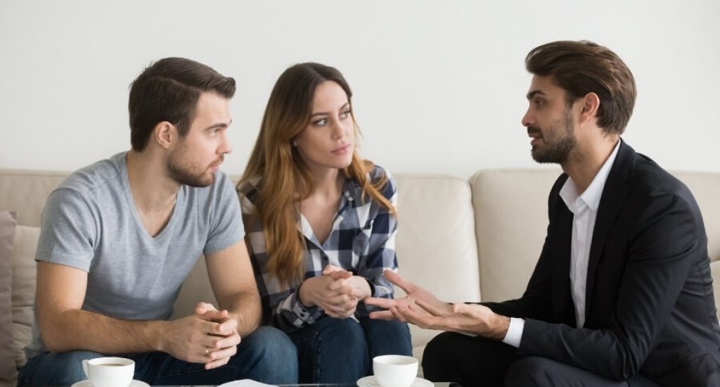 Landlord and tenant reviewing a sublease agreement